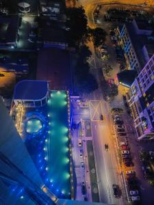an overhead view of a swimming pool at night at Diamond@Troika in Kota Bharu