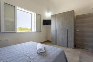 Postel nebo postele na pokoji v ubytování Home Paradise