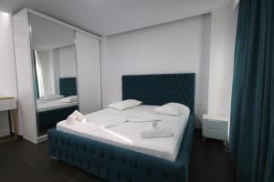 Postel nebo postele na pokoji v ubytování Memi Hotel