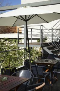 Um restaurante ou outro lugar para comer em Abril Hotel Boutique