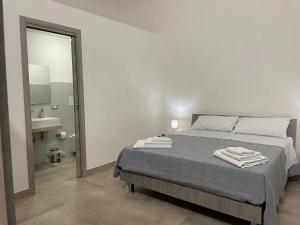 Postel nebo postele na pokoji v ubytování Home Paradise