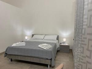 Postel nebo postele na pokoji v ubytování Home Paradise