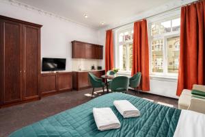 TV a/nebo společenská místnost v ubytování So in Sopot Apartments