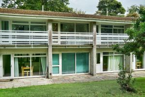 an external view of a house with large windows at Special 2 Bedroom Home in White Cross in Saint Columb Major