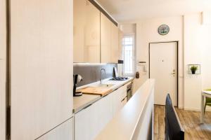 Kuchyň nebo kuchyňský kout v ubytování Bellarmino 21