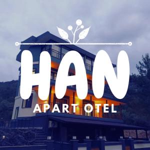 a sign for an apartment building with the words aharkived at Han Apart Otel in Didim