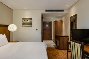 Postel nebo postele na pokoji v ubytování Protea Hotel by Marriott Benin City Select Emotan