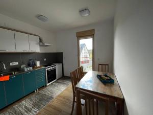A cozinha ou kitchenette de Sova apartman