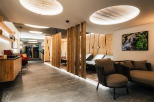 Posezení v ubytování Ferienresidenz Raich - Appartements mit Sky Wellness und Garten