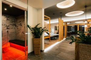 Posezení v ubytování Ferienresidenz Raich - Appartements mit Sky Wellness und Garten