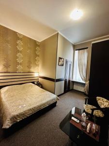 Posteľ alebo postele v izbe v ubytovaní Classic Hotel