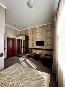Posteľ alebo postele v izbe v ubytovaní Classic Hotel