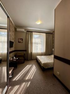 Posteľ alebo postele v izbe v ubytovaní Classic Hotel