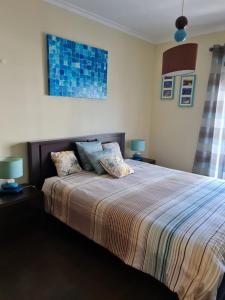 Postel nebo postele na pokoji v ubytování Marina Terrace - A045