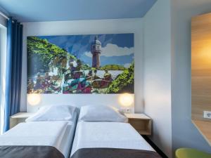 Postel nebo postele na pokoji v ubytování B&B Hotel Neu-Ulm