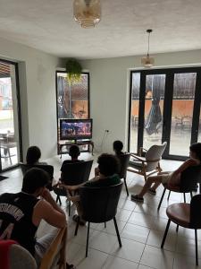 TV a/nebo společenská místnost v ubytování Olympia Ureki Guria Street 24-26