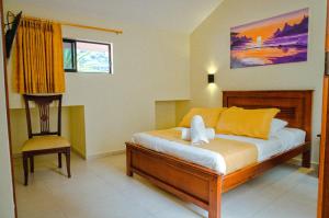 Voodi või voodid majutusasutuse Hostal CañaLimeña toas