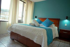 Voodi või voodid majutusasutuse Hostal CañaLimeña toas