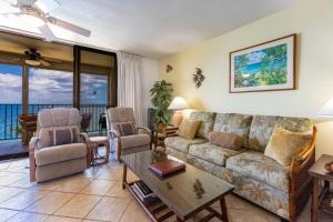 a living room with a couch and a table at KIHEI BEACH, #507 condo in Kihei