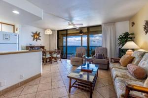 a living room with a couch and a table at KIHEI BEACH, #507 condo in Kihei