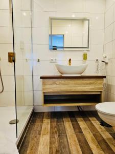 Koupelna v ubytování Gala Hotel