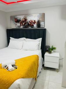 Voodi või voodid majutusasutuse Chimas Guest House toas