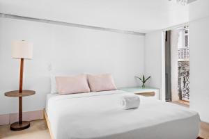 Postel nebo postele na pokoji v ubytování Luxury Home - Rooftop Garden - Heart of Old San Juan