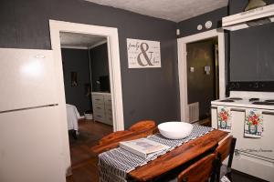 a kitchen with a table with a bowl on it at Couple Getaway 5 mins from Downtown in Knoxville