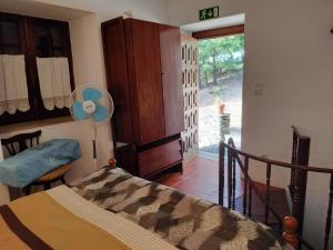 Postel nebo postele na pokoji v ubytování Casa da Lomba