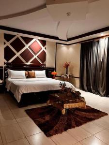 A bed or beds in a room at ركن فينيسيا للشقق المخدومة