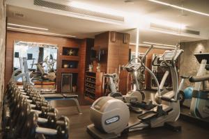 a gym with several treadmills and exercise machines at Hotel Fasano Rio de Janeiro in Rio de Janeiro