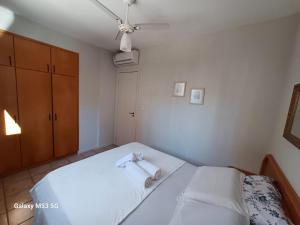 Postel nebo postele na pokoji v ubytování Apto Aconchegante 2 Quartos 100m praia de Caiobá - Somente Familiares
