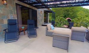 Ruang duduk di Suite La Orquidea