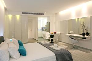 Гостиная зона в Corina Suites & Apartments +30 фотографий