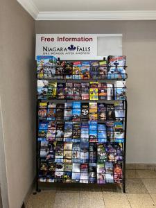 a display of comic books on a shelf at The Glengate Hotel & Suites in Niagara Falls