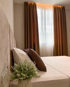 Кровать или кровати в номере Solea Hotel