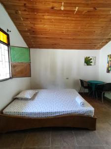 Krevet ili kreveti u jedinici u okviru objekta Bahareque Hostal