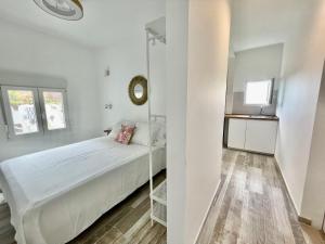 Postel nebo postele na pokoji v ubytování Eden Gomera Suites