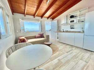 Kuchyň nebo kuchyňský kout v ubytování Eden Gomera Suites