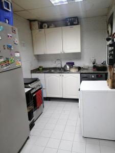 Kuchyň nebo kuchyňský kout v ubytování ETAS Residence
