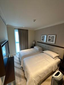 Postel nebo postele na pokoji v ubytování Downtown Address Burj Khalifa