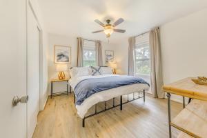 a bedroom with a bed and a ceiling fan at Cloudcroft Vacation Rental about 1 Mi to Downtown! in Cloudcroft