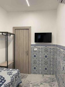 TV a/nebo společenská místnost v ubytování Zaman Ya Zaman Boutique Hotel