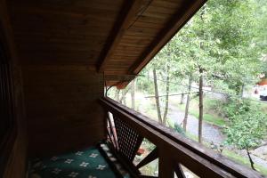 Balkón nebo terasa v ubytování Complex Țurcana Transalpina