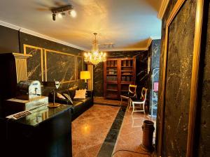 Uma área de estar em Alojamento VINTAGE BAIXA - TOMAR