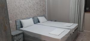 Postel nebo postele na pokoji v ubytování RUBENYAN GUEST HOUSE