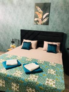 Ein Bett oder Betten in einem Zimmer der Unterkunft New Star