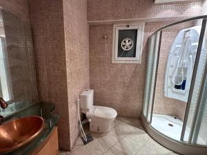 Koupelna v ubytování Dreamland - Emerald + 2 fotografie