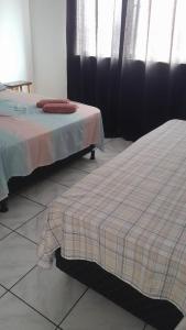 מיטה או מיטות בחדר ב-Condôminio Novo Horizonte. Acupe de Brotas