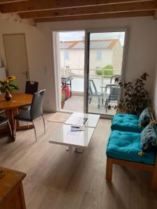 Χώρος καθιστικού στο Gîte 2 terrasses - 4 Pers - Plus Lit d'appoint-Draps et Serviettes Optionnels non prévu dans le prix affiché